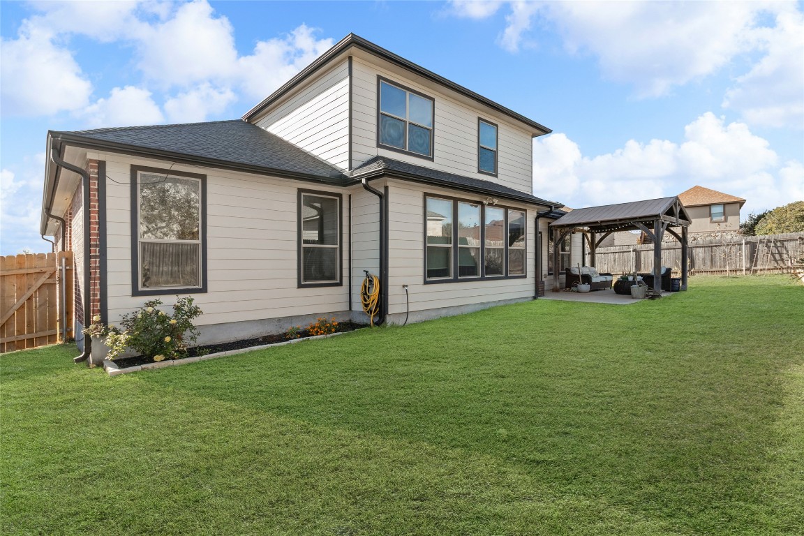 920 Autumn Sage Way Pflugerville, TX 78660 - Photo 29 of 30 a front view of a house with a yard