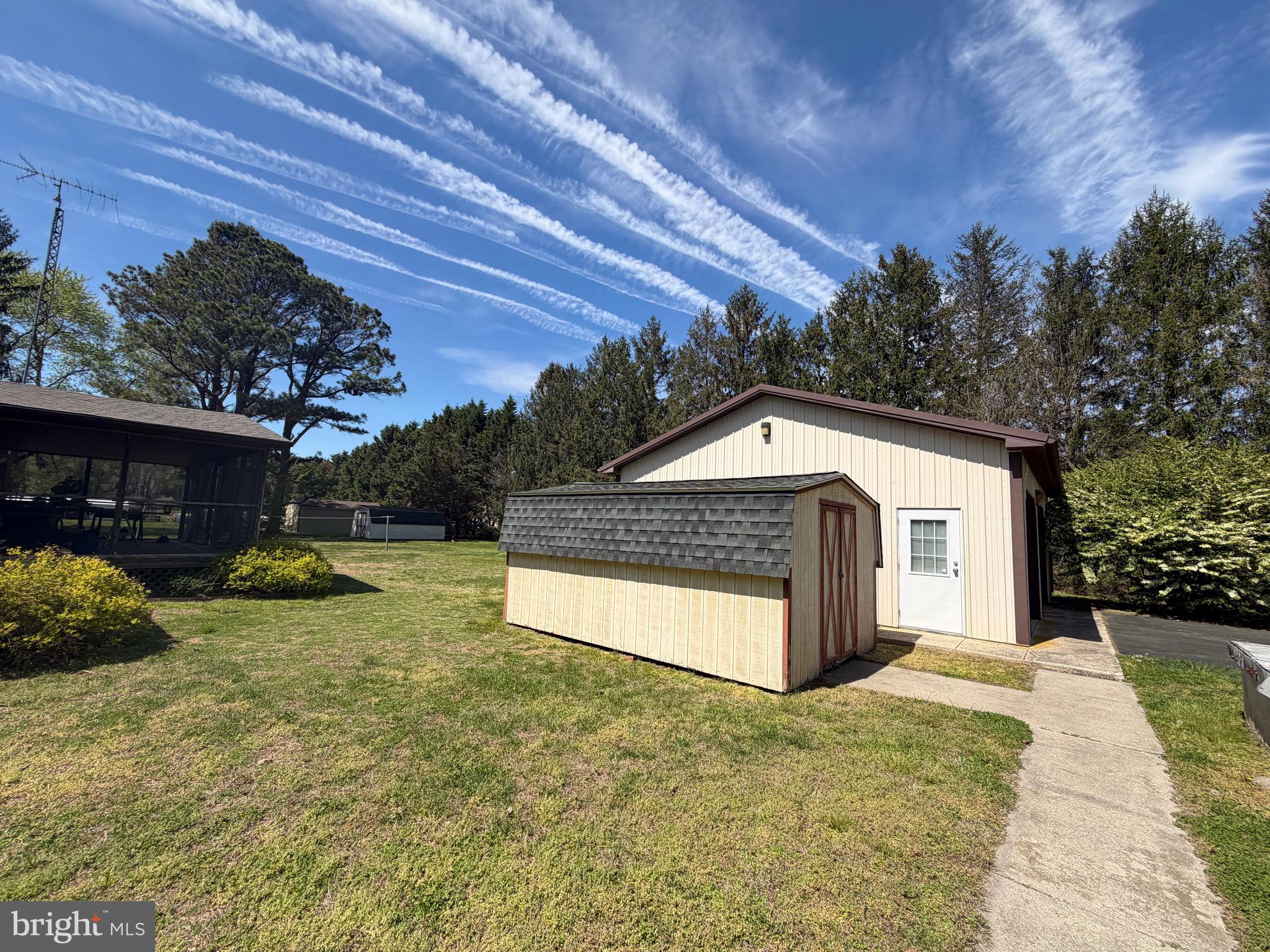 10482 Blacksmith Shop Road Greenwood, DE 19950 - Photo 2 of 3 Sideyard / driveway /huge pole barn + electric