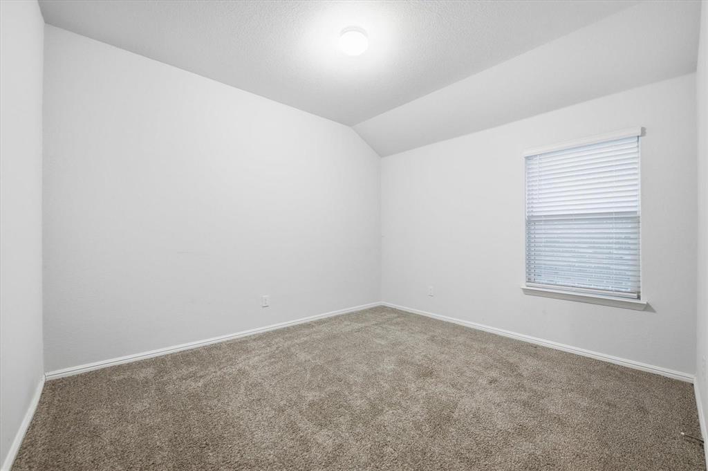 9308 Desertrock Road Fort Worth, TX 76131 - Photo 20 of 29 an empty room with a window