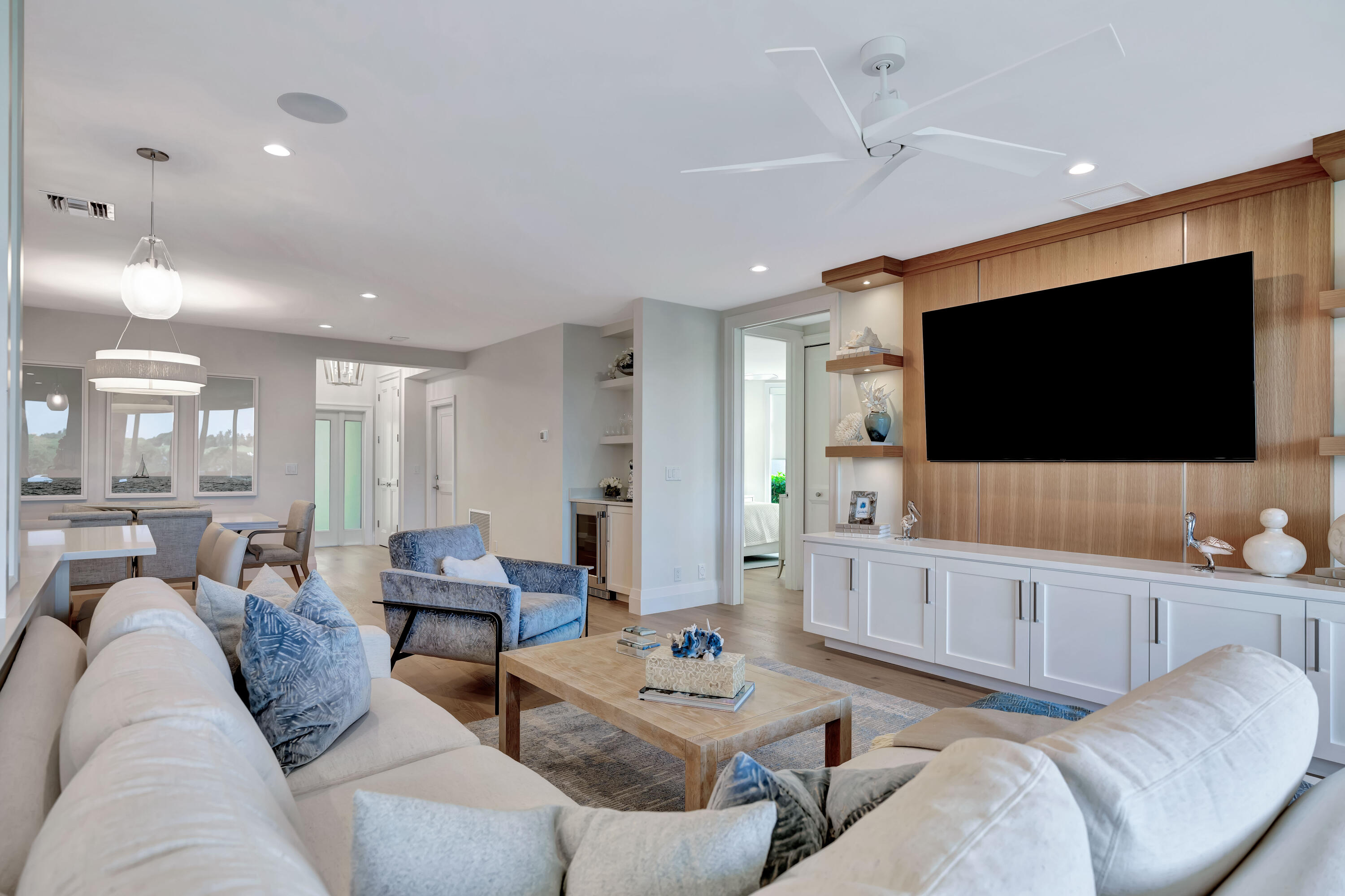 260 Eagle Drive Jupiter, FL 33477 - Photo 11 of 41 a living room with furniture and a flat screen tv