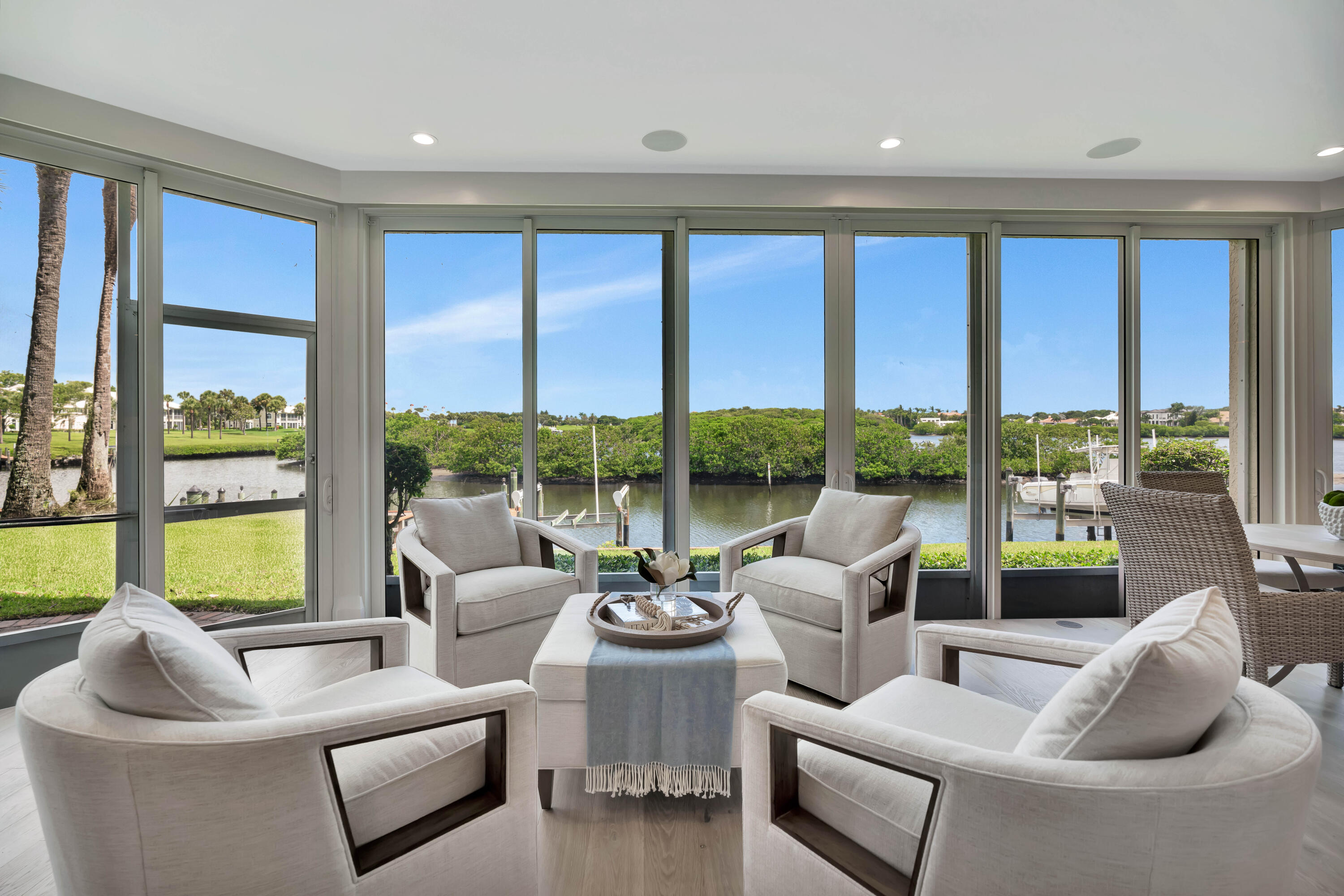 260 Eagle Drive Jupiter, FL 33477 - Photo 18 of 41 a living room with furniture and a large window