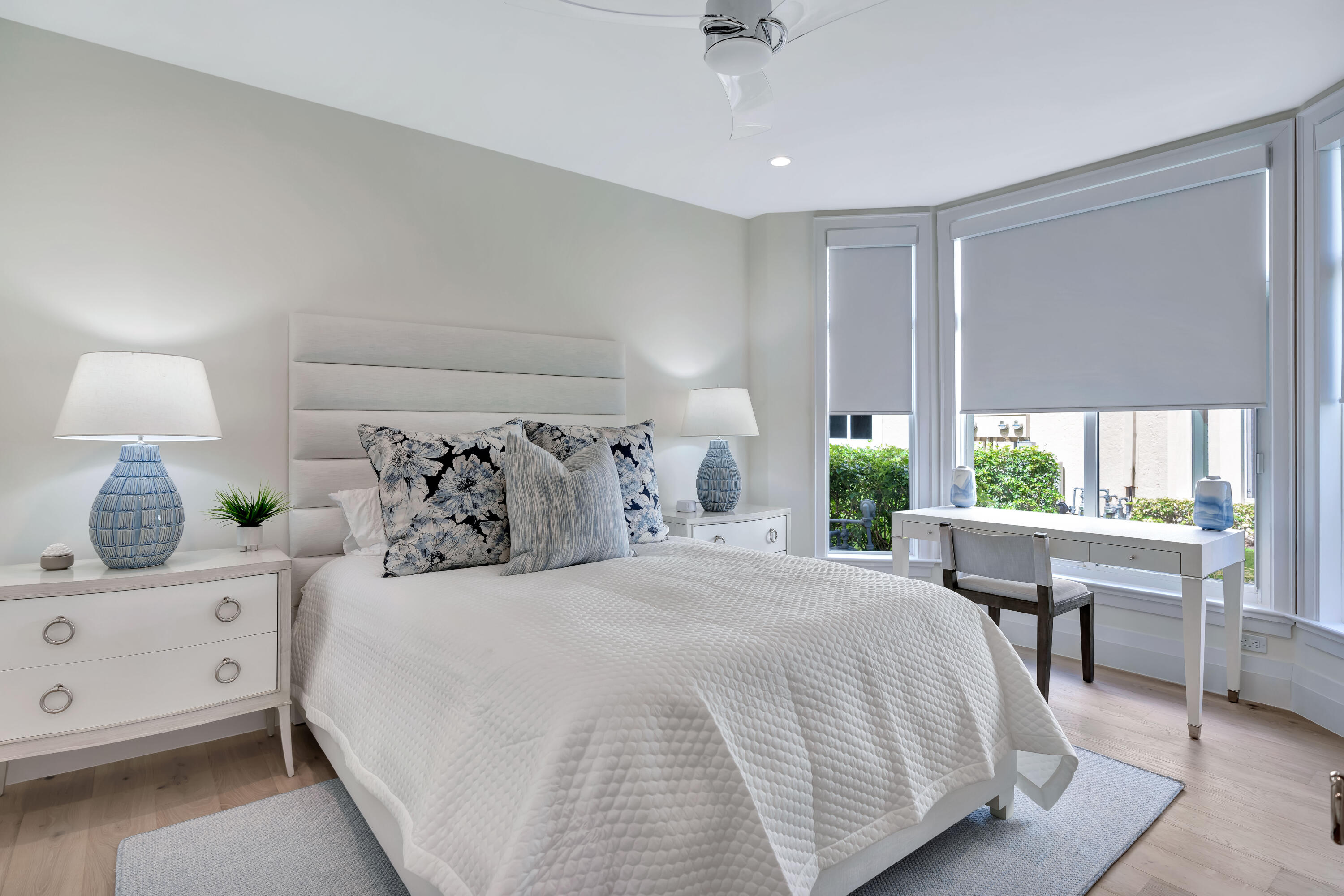 260 Eagle Drive Jupiter, FL 33477 - Photo 31 of 41 a bedroom with a large bed and a window