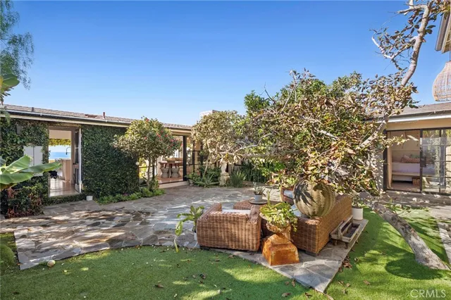 a bathroom with a mirror and a sink