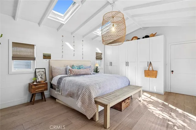 a bathroom with a sink mirror and vanity