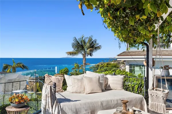 a view of a chairs and table in a patio