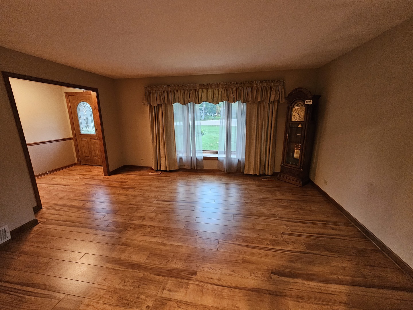7N715 Sycamore Road St. Charles, IL 60175 - Photo 12 of 20 a view of empty room with wooden floor and fan