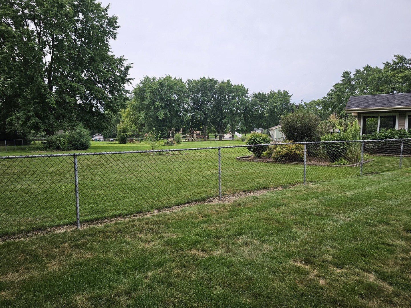 7N715 Sycamore Road St. Charles, IL 60175 - Photo 4 of 20 a view of a field with grass