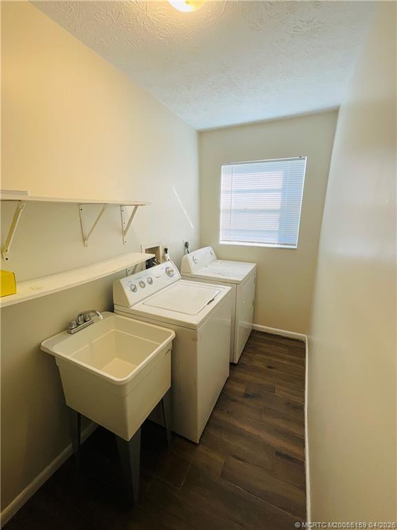 941 Southwest Fenway Road Port St. Lucie, FL 34953 - Photo 14 of 15 a bathroom with a sink and a mirror