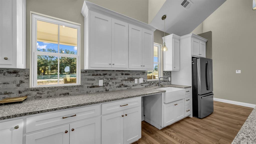 3451 Eleanor Tbd County Road Paradise, TX 76073 - Photo 13 of 25 a kitchen with stainless steel appliances granite countertop a refrigerator sink and cabinets