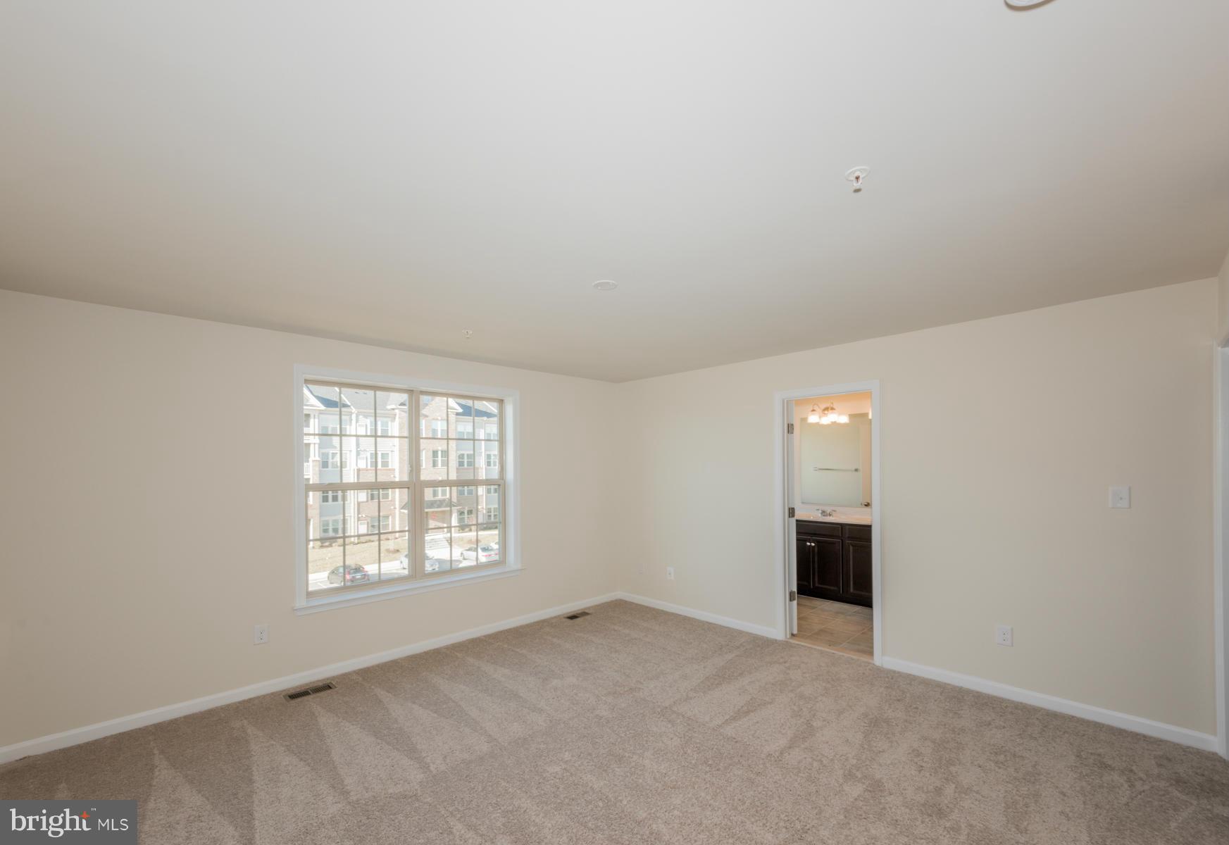 4716 Cambria Road Frederick, MD 21703 - Photo 18 of 27 an empty room with windows