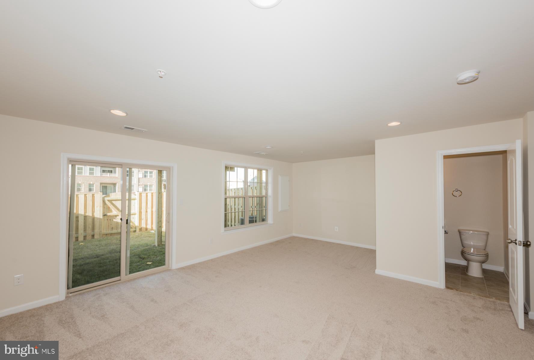4716 Cambria Road Frederick, MD 21703 - Photo 22 of 27 an empty room with windows and closet