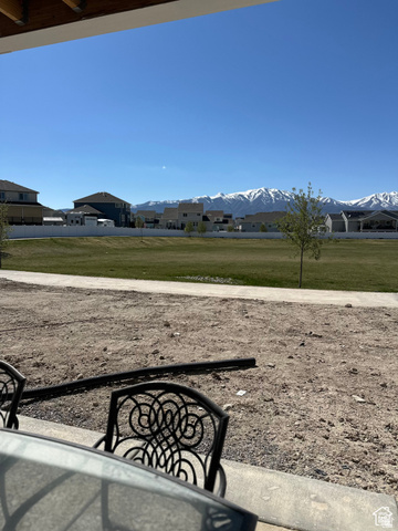 7927 Bristlecone Road, Unit 204 Eagle Mountain, UT 84005 - Photo 19 of 19 View of green lawn with a mountain view