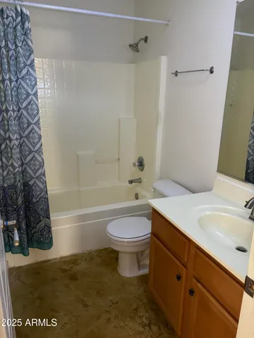 a bathroom with a sink a toilet and a bathtub