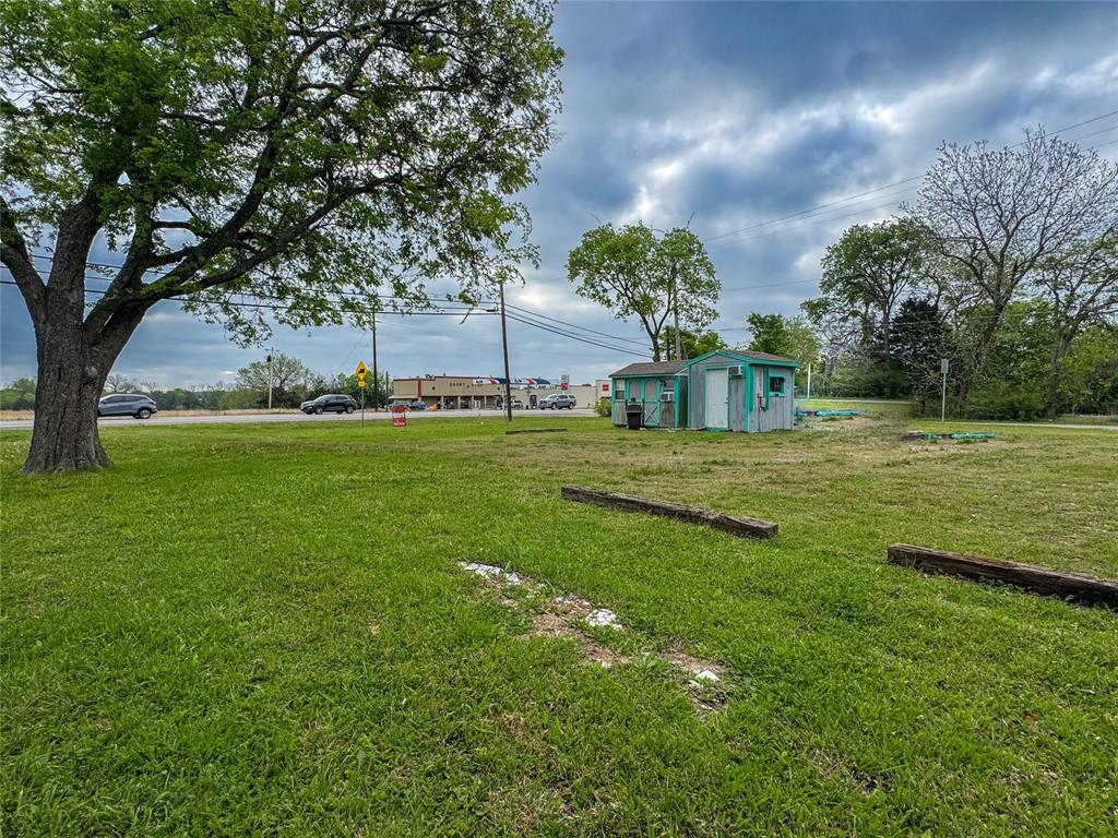 101 Wallace Street Lone Oak, TX 75453 - Photo 11 of 11 a view of a golf course with a big yard