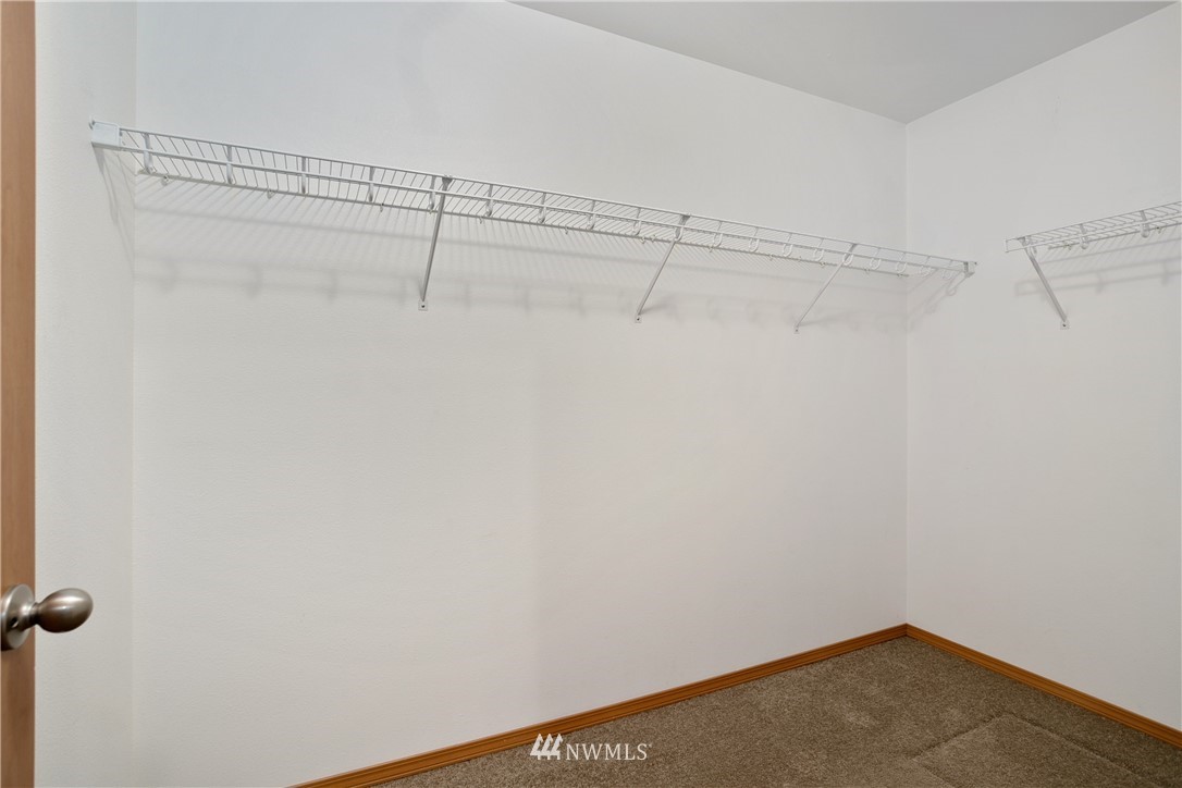 4337 Maytown Road Southwest Olympia, WA 98512 - Photo 20 of 30 a view of a room with racks on the wall