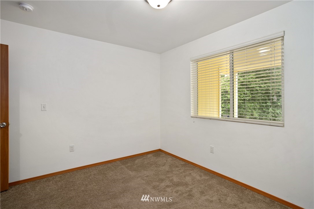 4337 Maytown Road Southwest Olympia, WA 98512 - Photo 22 of 30 an empty room with a window