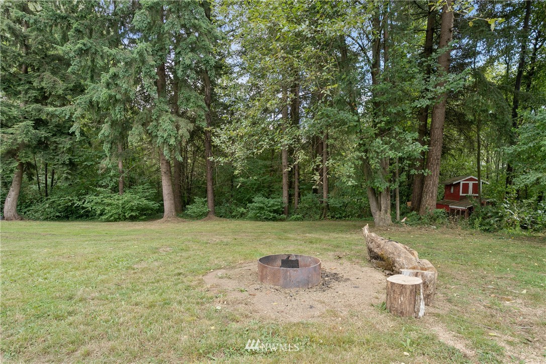 4337 Maytown Road Southwest Olympia, WA 98512 - Photo 30 of 30 a view of a backyard with swimming pool