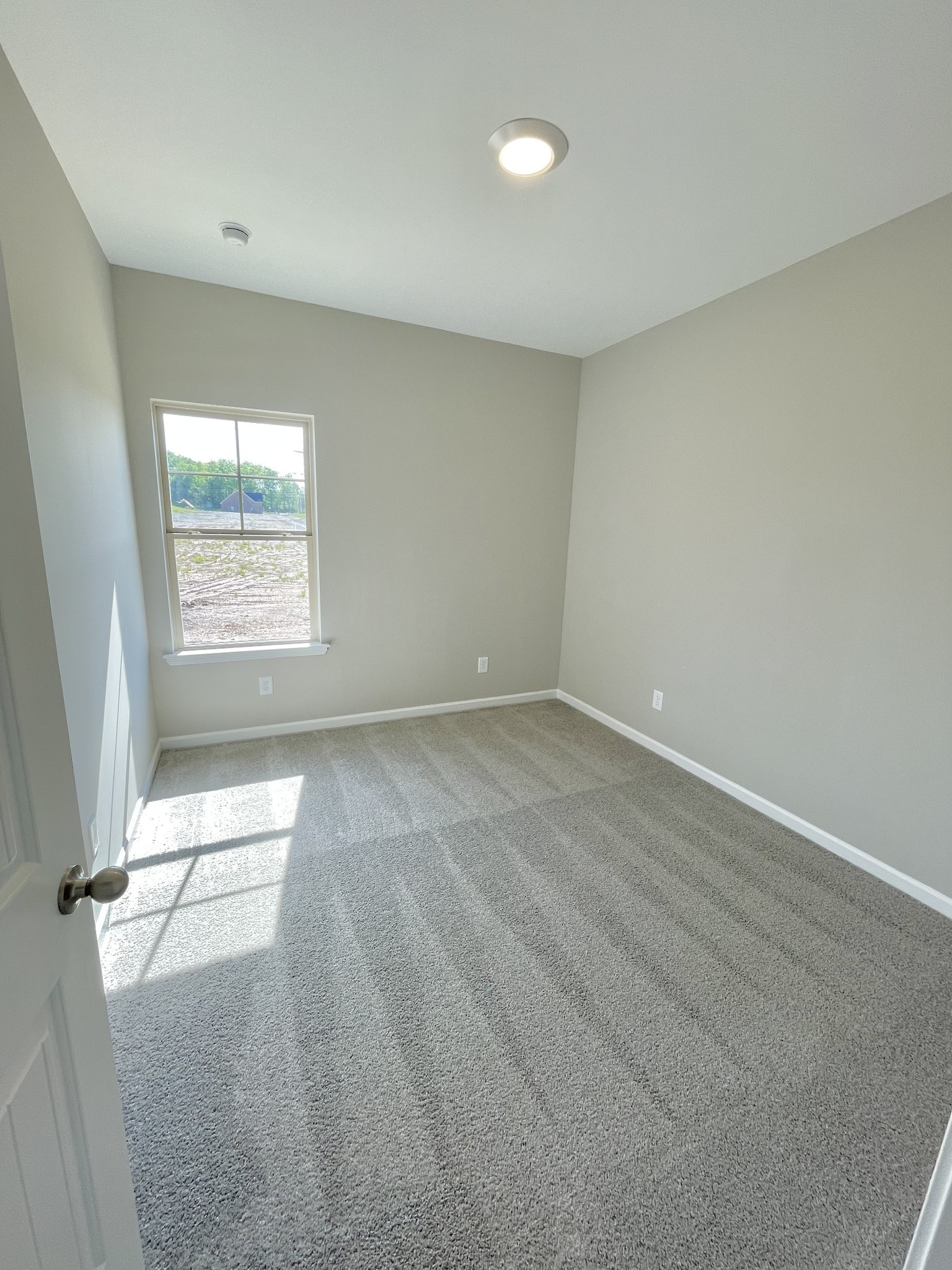 704 Rex Dr Spring Hill Spring Hill, TN 37174 - Photo 12 of 21 an empty room with a window