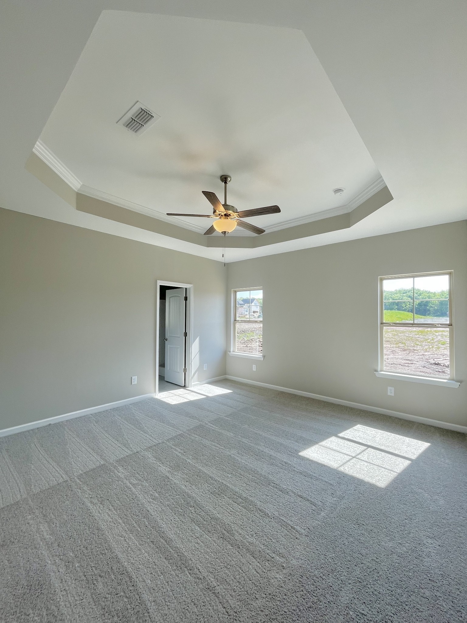 704 Rex Dr Spring Hill Spring Hill, TN 37174 - Photo 14 of 21 an empty room with windows and ceiling fan