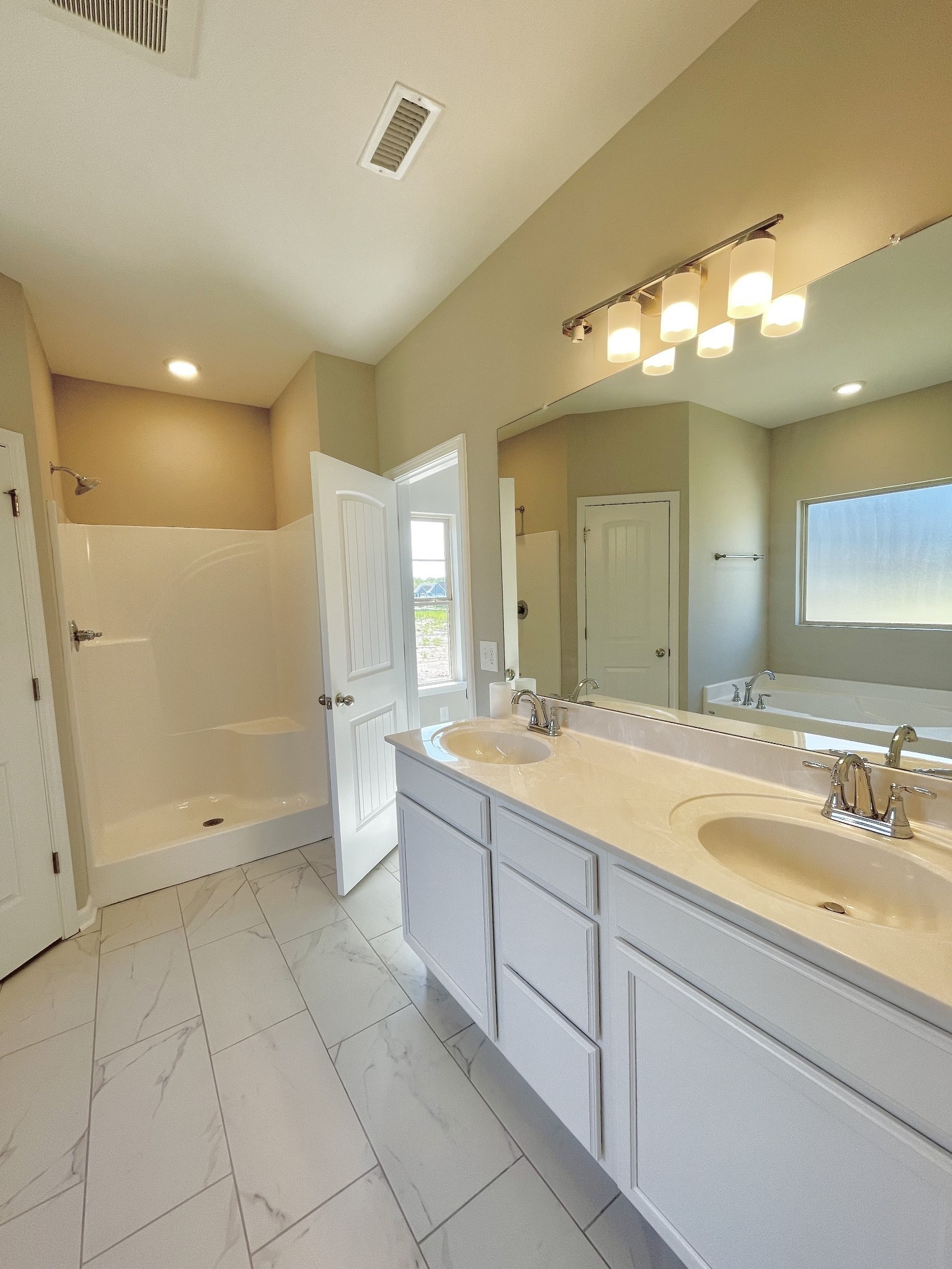 704 Rex Dr Spring Hill Spring Hill, TN 37174 - Photo 15 of 21 a bathroom with a granite countertop sink mirror and bathtub