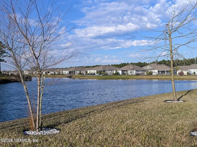 a view of a yard with an outdoor space