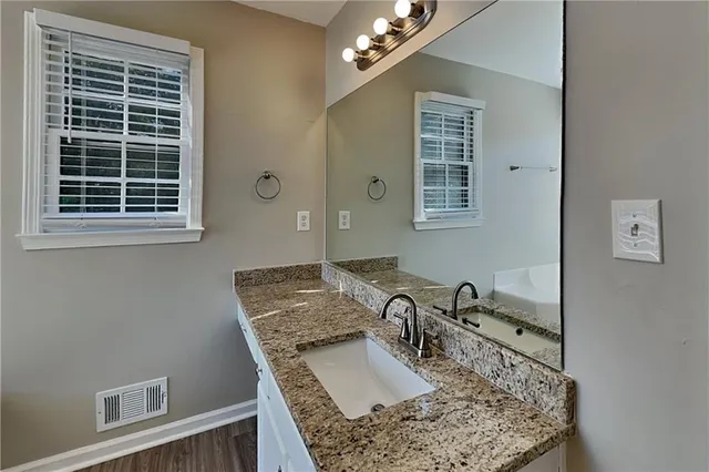 a view of a kitchen area with furniture and window