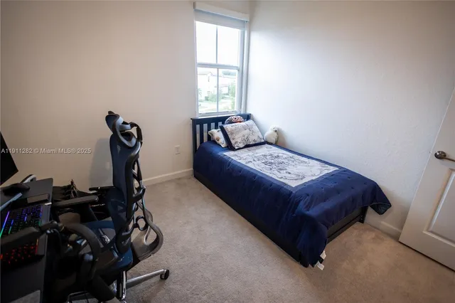 a bedroom with a bed and a closet