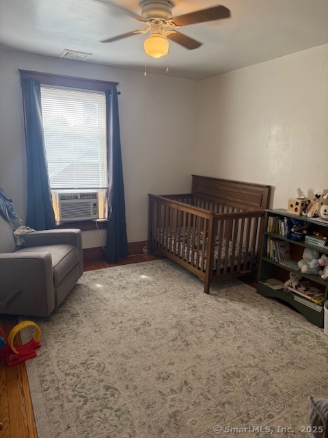 18 Walnut Street Bristol, CT 06010 - Photo 2 of 13 a view of an empty room with window