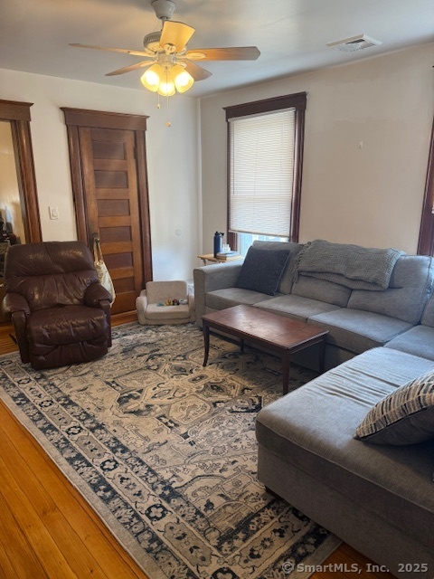 18 Walnut Street Bristol, CT 06010 - Photo 4 of 13 a living room with furniture and a rug