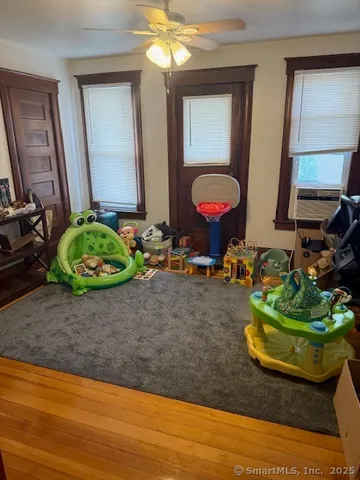 a room with lots of potted plants