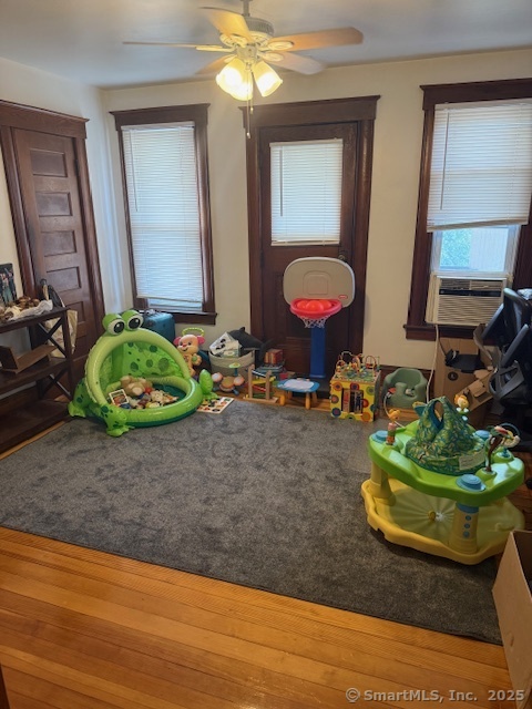 18 Walnut Street Bristol, CT 06010 - Photo 6 of 13 a room with lots of potted plants