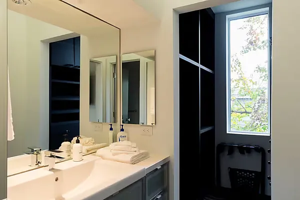 a view of an empty room with a window