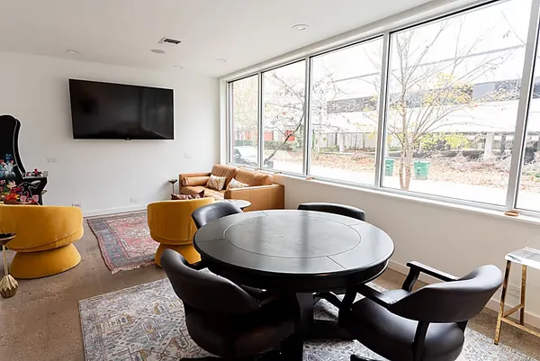 a bathroom with a sink mirror vanity and toilet