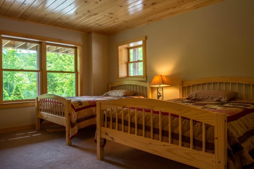 116 Monkey Brook Road Newry, ME 04261 - Photo 29 of 35 The lower level bedroom offers two...
