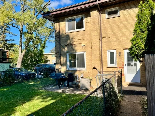 a view of a house with a yard porch and sitting area