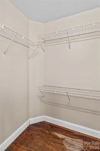 a view of a room with racks on the wall