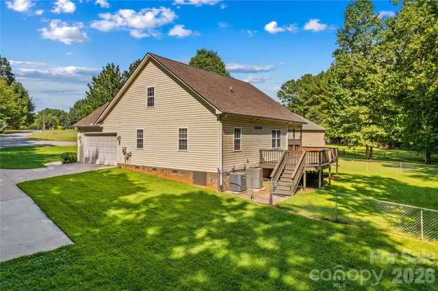 a view of a house with a yard porch and sitting area