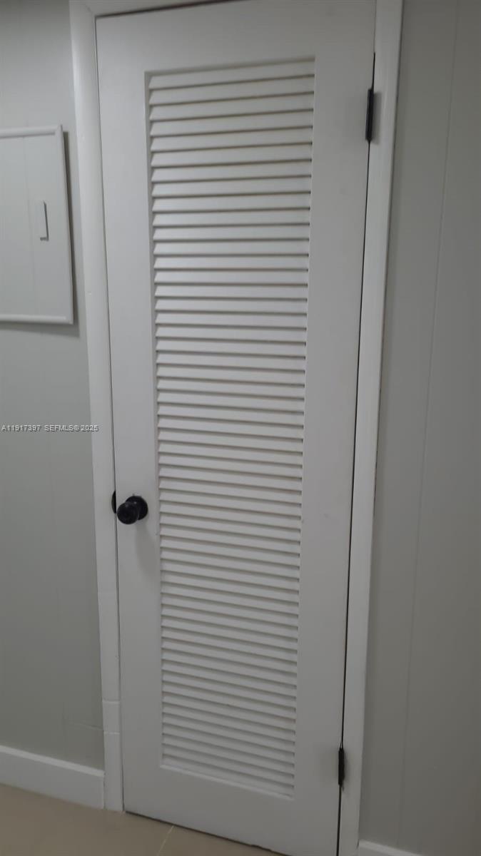 57 Cambridge C, Unit 57 West Palm Beach, FL 33417 - Photo 11 of 36 a bathroom with a shower