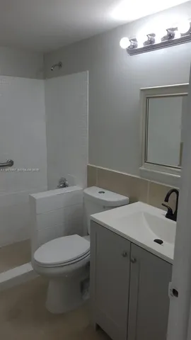 a bathroom with a sink and a toilet