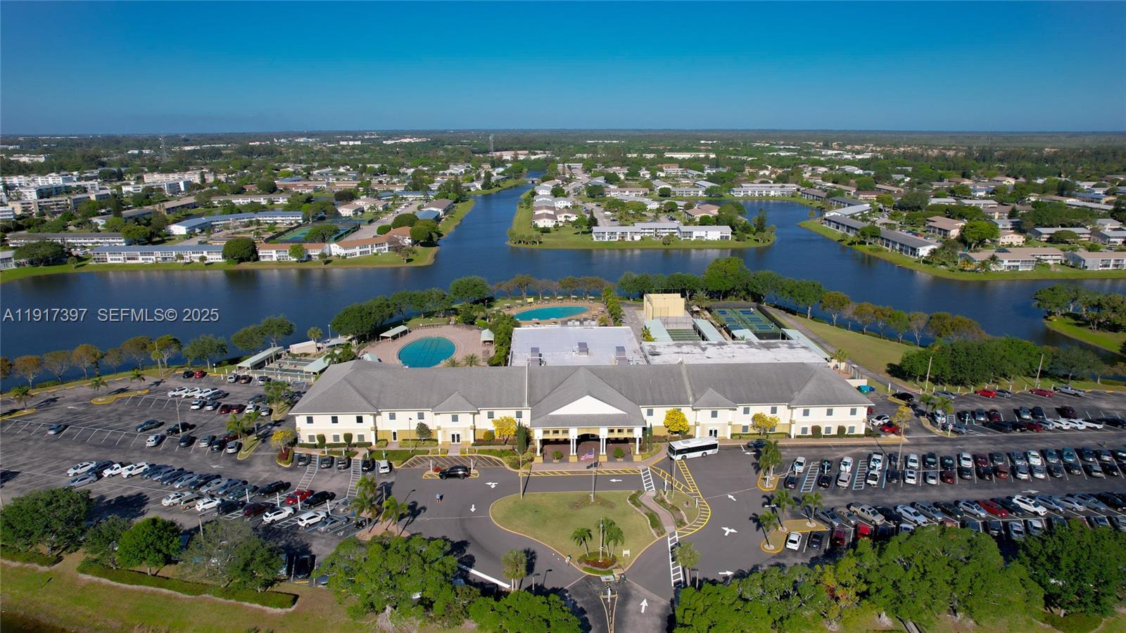 57 Cambridge C, Unit 57 West Palm Beach, FL 33417 - Photo 18 of 36 an aerial view of multiple house