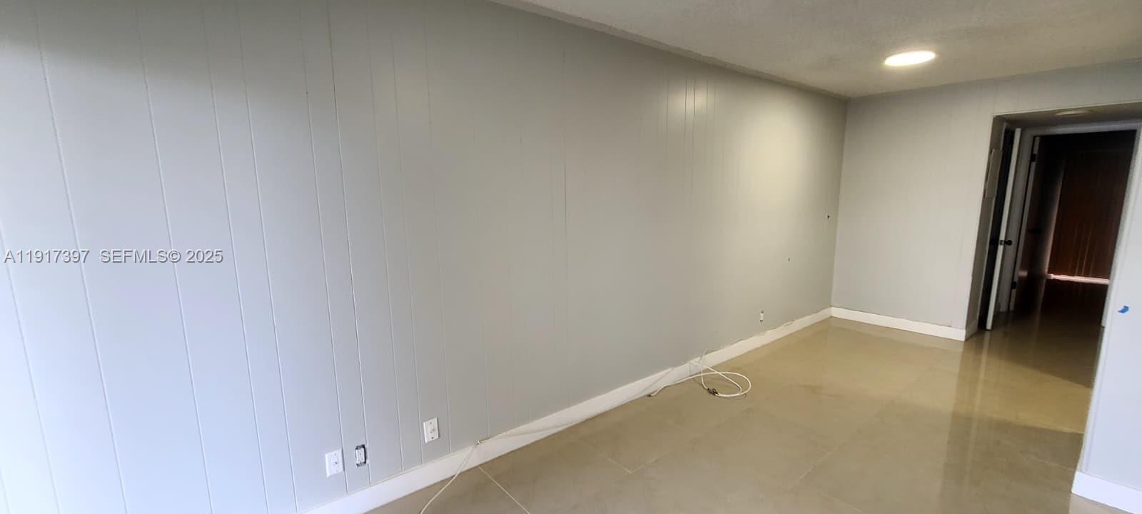 57 Cambridge C, Unit 57 West Palm Beach, FL 33417 - Photo 7 of 36 a view of an empty room