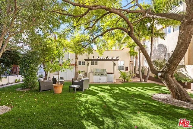 a garden view with a seating space