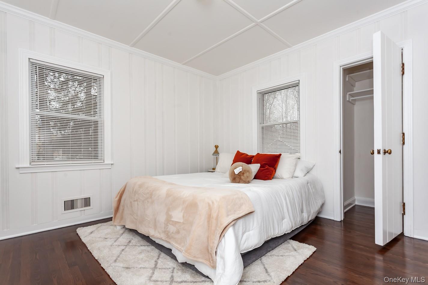 15 Waring Road Newburgh, NY 12550 - Photo 19 of 42 a bedroom with a bed and wooden floor