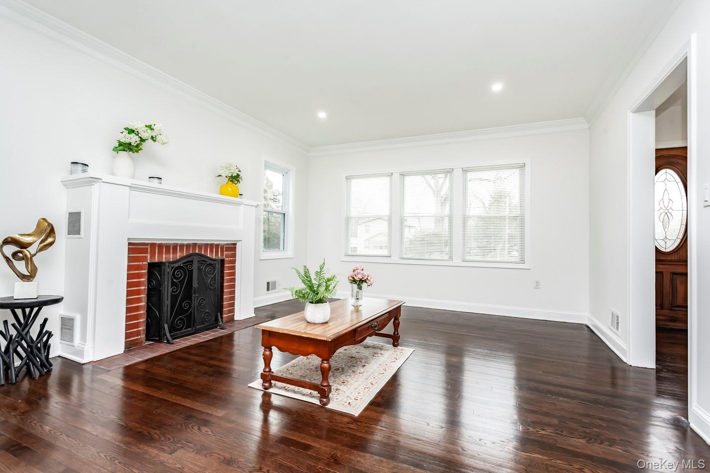 15 Waring Road Newburgh, NY 12550 - Photo 4 of 42 a living room with furniture and a fireplace