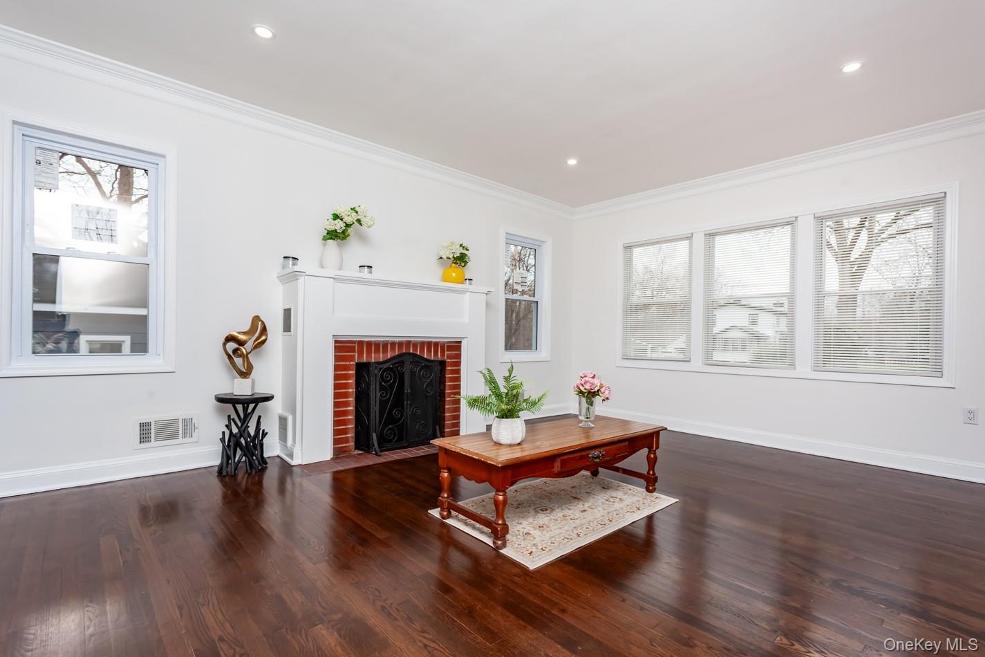 15 Waring Road Newburgh, NY 12550 - Photo 5 of 42 a living room with furniture and a fireplace