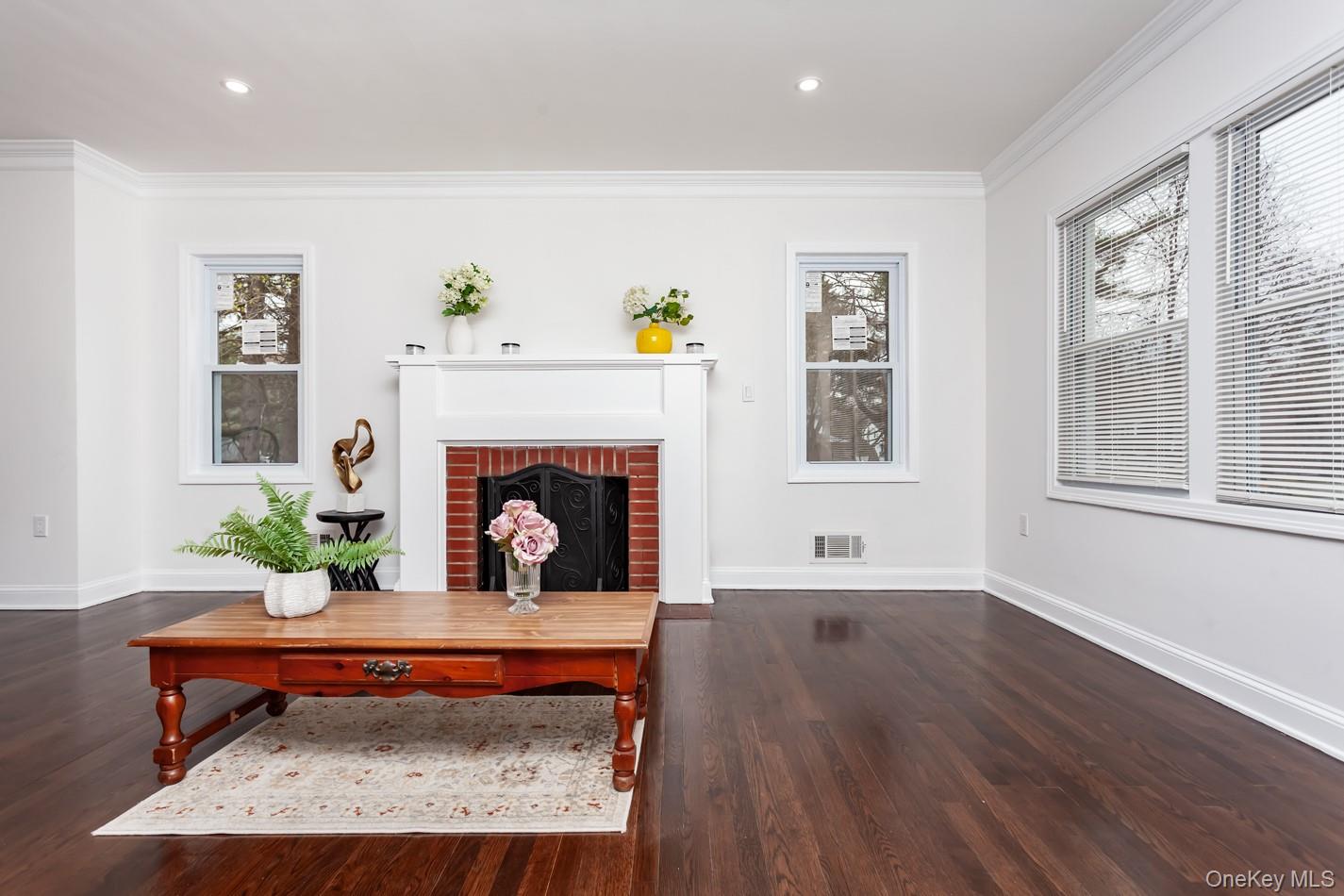 15 Waring Road Newburgh, NY 12550 - Photo 6 of 42 a living room with furniture and a fireplace
