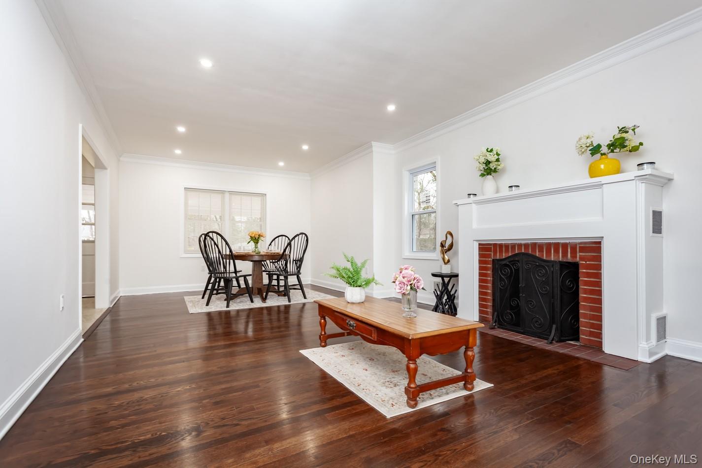 15 Waring Road Newburgh, NY 12550 - Photo 7 of 42 a living room with furniture and a fireplace