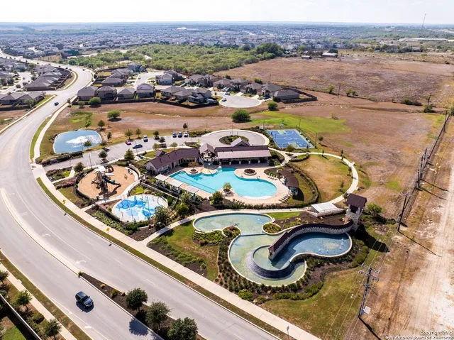 an aerial view of swimming pool and outdoor space