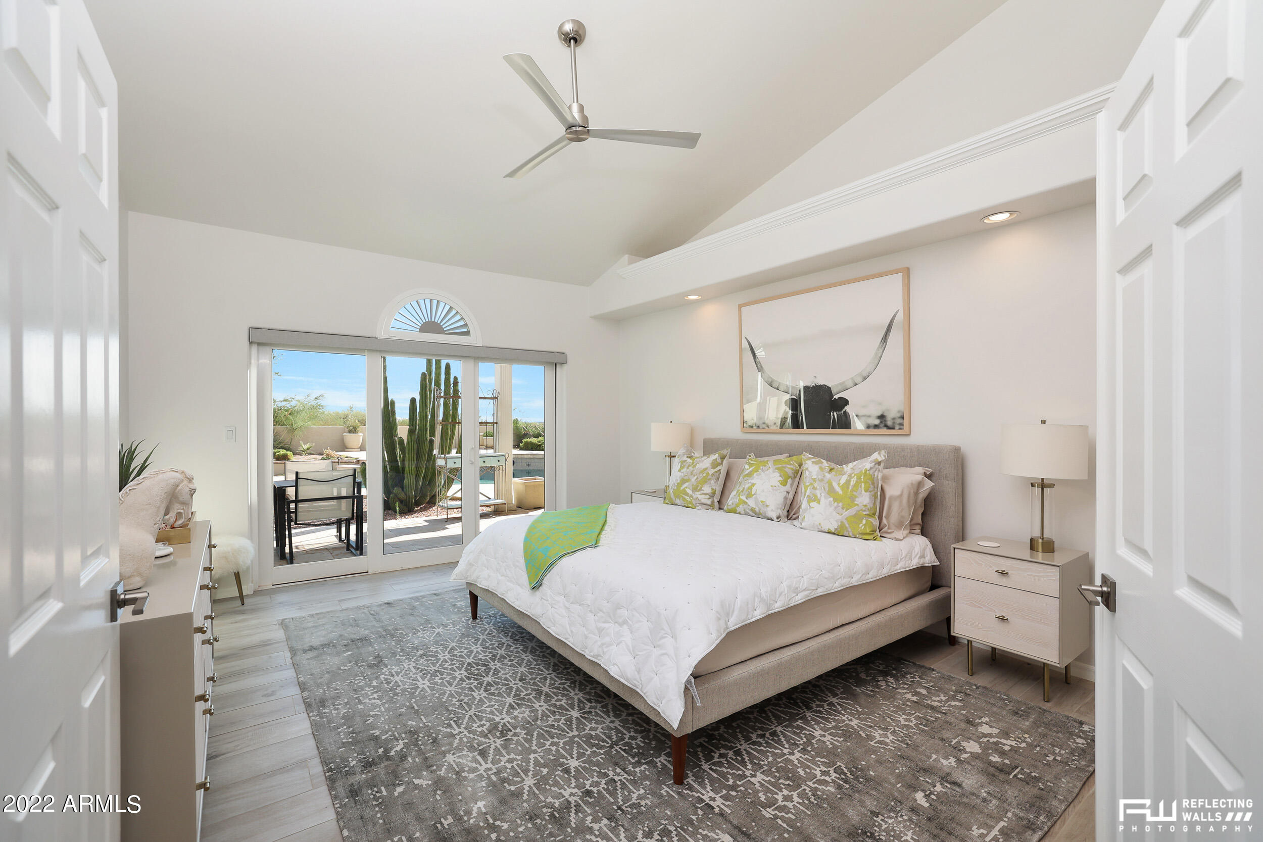 10085 East Doubletree Ranch Road Scottsdale, AZ 85258 - Photo 34 of 62 a bedroom with a large bed and a large window