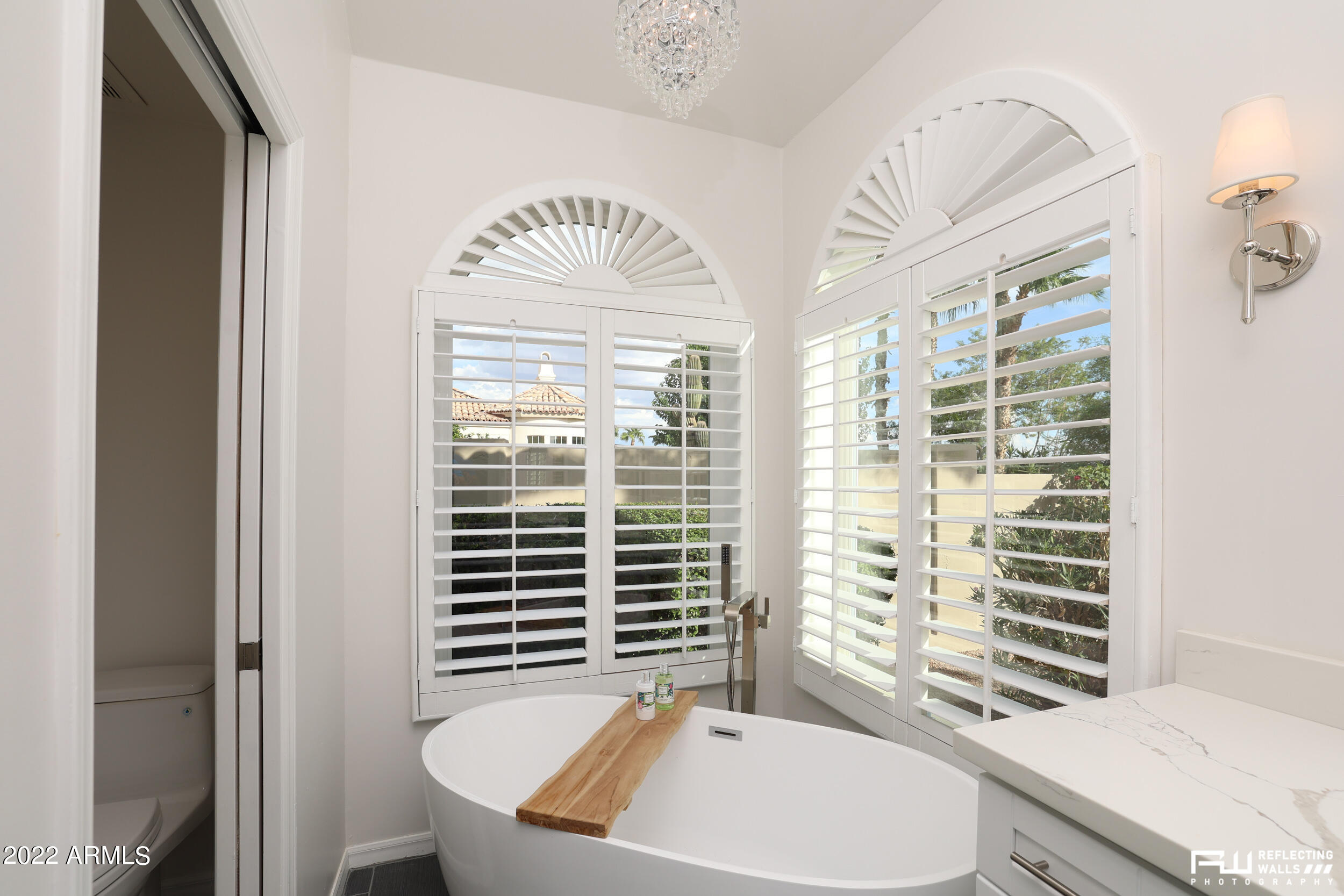 10085 East Doubletree Ranch Road Scottsdale, AZ 85258 - Photo 37 of 62 a bathroom with a sink a toilet and shower